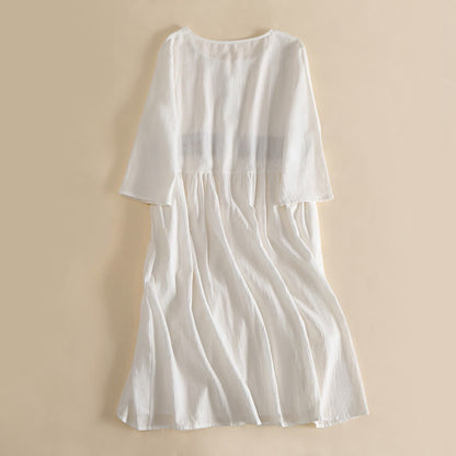 Relaxed Embroidered Midi Dress with Buttoned Neckline and Pockets