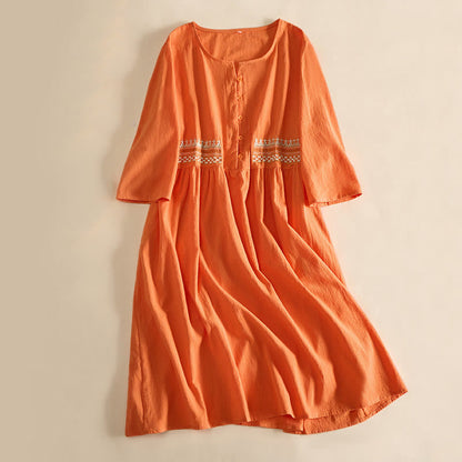 Relaxed Embroidered Midi Dress with Buttoned Neckline and Pockets