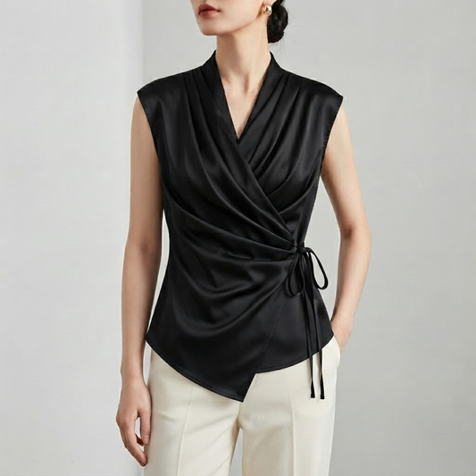 Tailored Sleeveless Wrap Blouse with Pleated Draping and Side Tie Closure