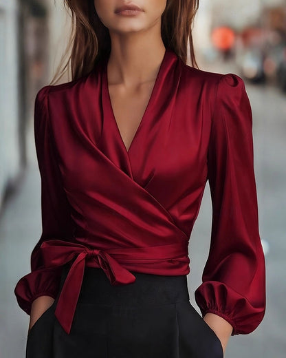 Flowing V-Neck Blouse with Delicate Lace-Up Detail
