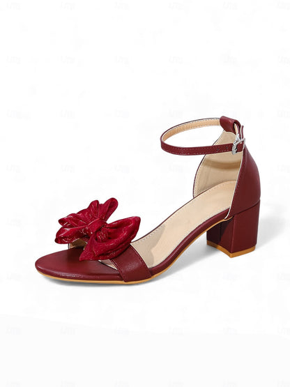 Elevated Ankle Strap Block Heels with Statement Bow Embellishment
