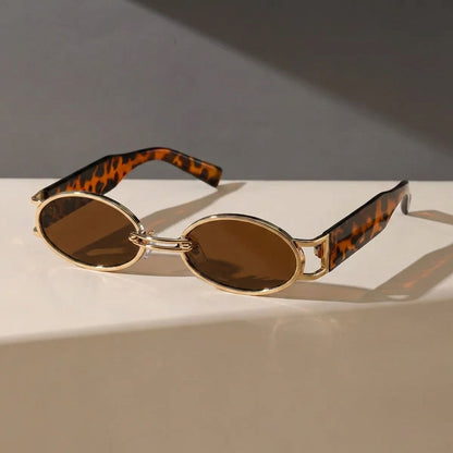 Retro-Inspired Oval Frame Sunglasses with Sculpted Metallic Accents