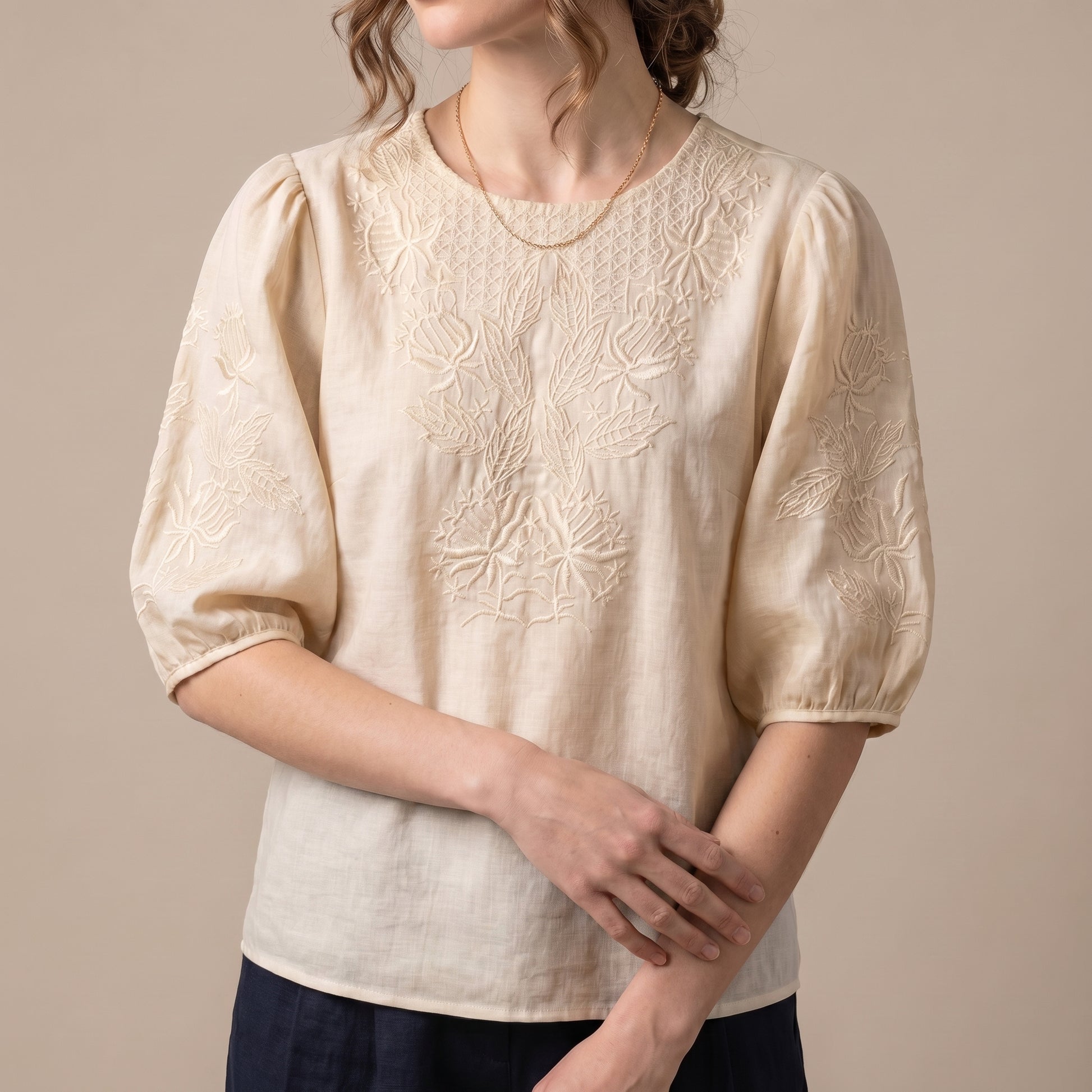 Relaxed Woven Top with Intricate Floral Embroidery and Puff Sleeves