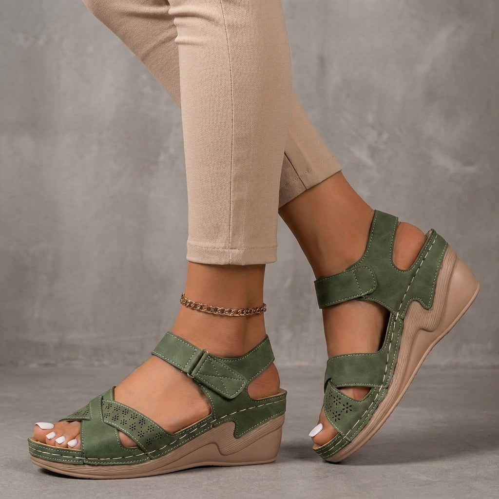 Textured Wedge Sandals with Laser-Cut Floral Accents and Adjustable Strap