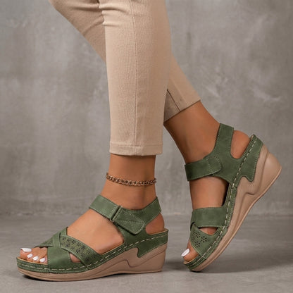 Textured Wedge Sandals with Laser-Cut Floral Accents and Adjustable Strap