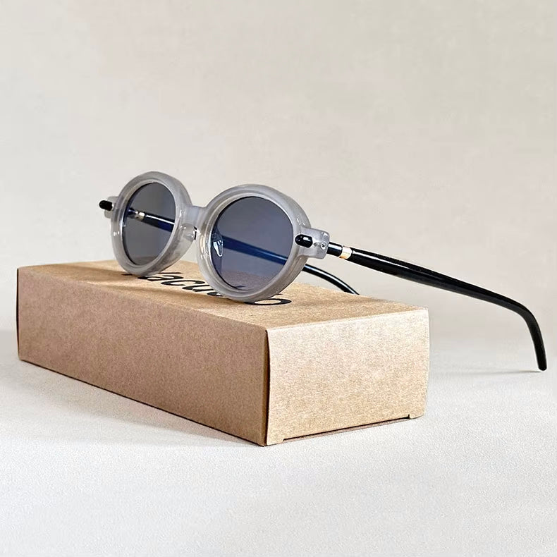 Vintage-Inspired Oval Sunglasses with Glossy Mottled Frames