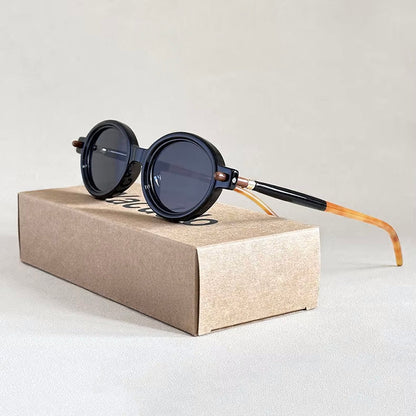 Vintage-Inspired Oval Sunglasses with Glossy Mottled Frames