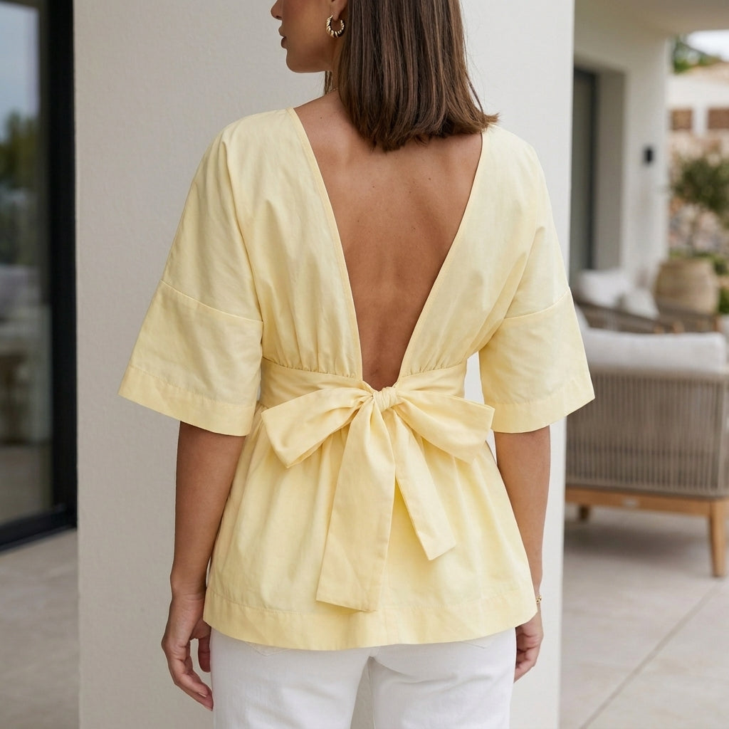 Romantic Peplum Blouse with Soft Waist Detail and Relaxed Fit