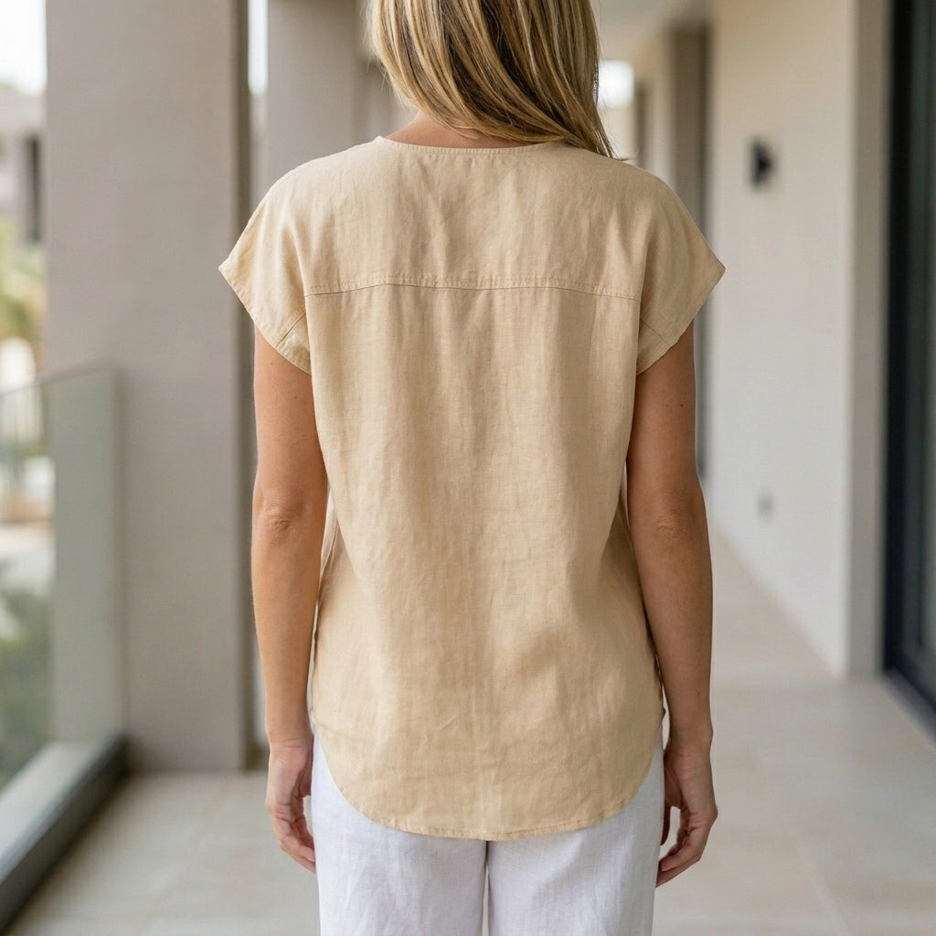 Relaxed Sleeveless Button-Up Blouse with Soft Drape and Front Pockets