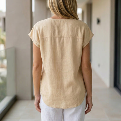 Relaxed Sleeveless Button-Up Blouse with Soft Drape and Front Pockets