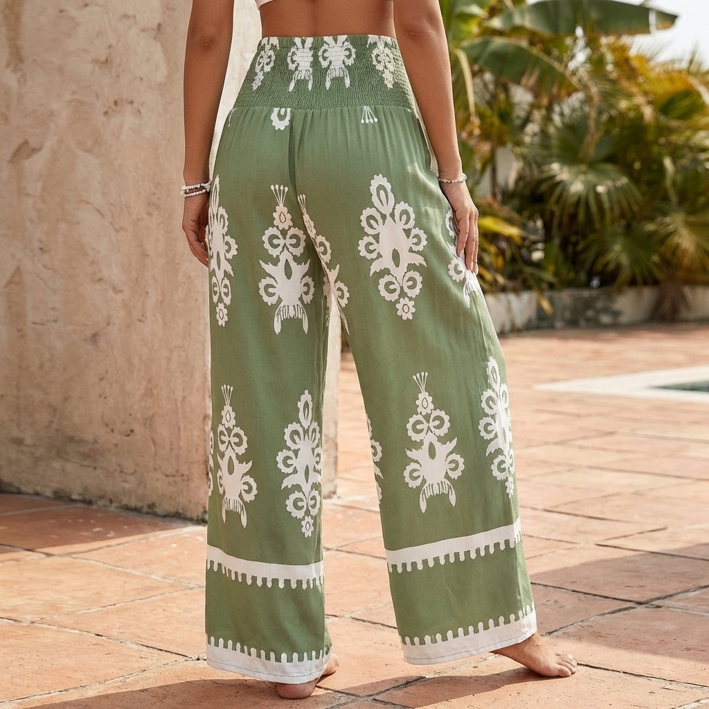 Bohemian-Inspired Flowing Wide-Leg Pants with Ornate Gathered Waist and Decorative Hem