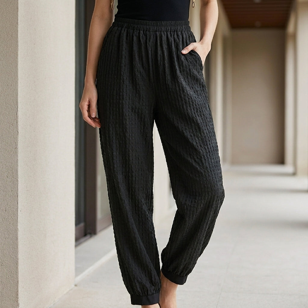 Relaxed Plaid Drawstring Harem Pants with Tapered Ankle Cuff Design