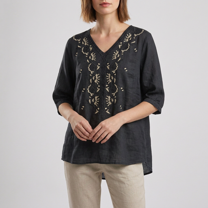 Relaxed V-Neck Blouse with Embroidered Floral Accents and High-Low Hem