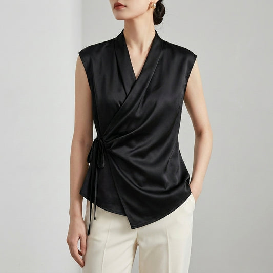Tailored Sleeveless Wrap Blouse with Pleated Draping and Side Tie Closure