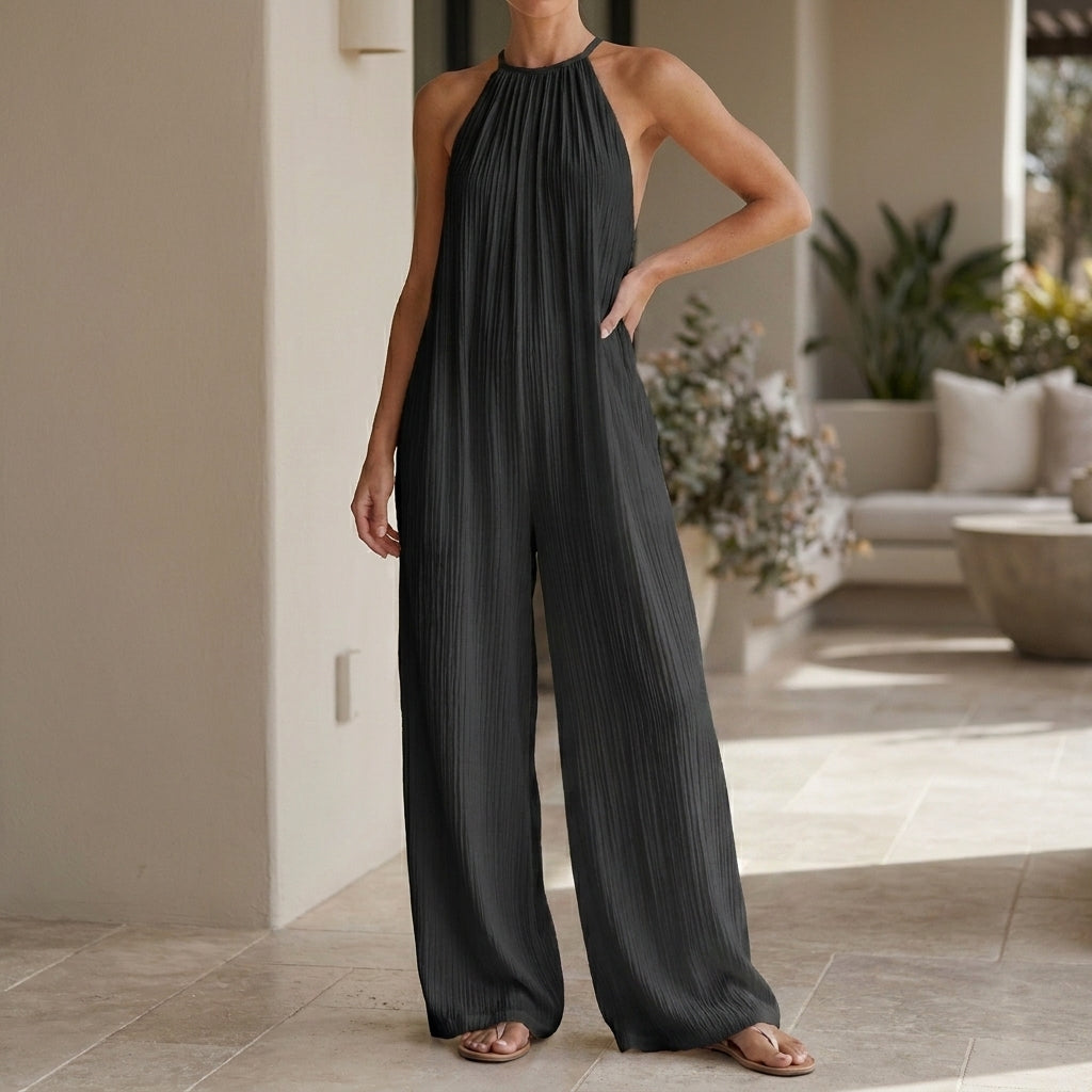 Pleated Halter Jumpsuit with Flowing Wide Leg Silhouette
