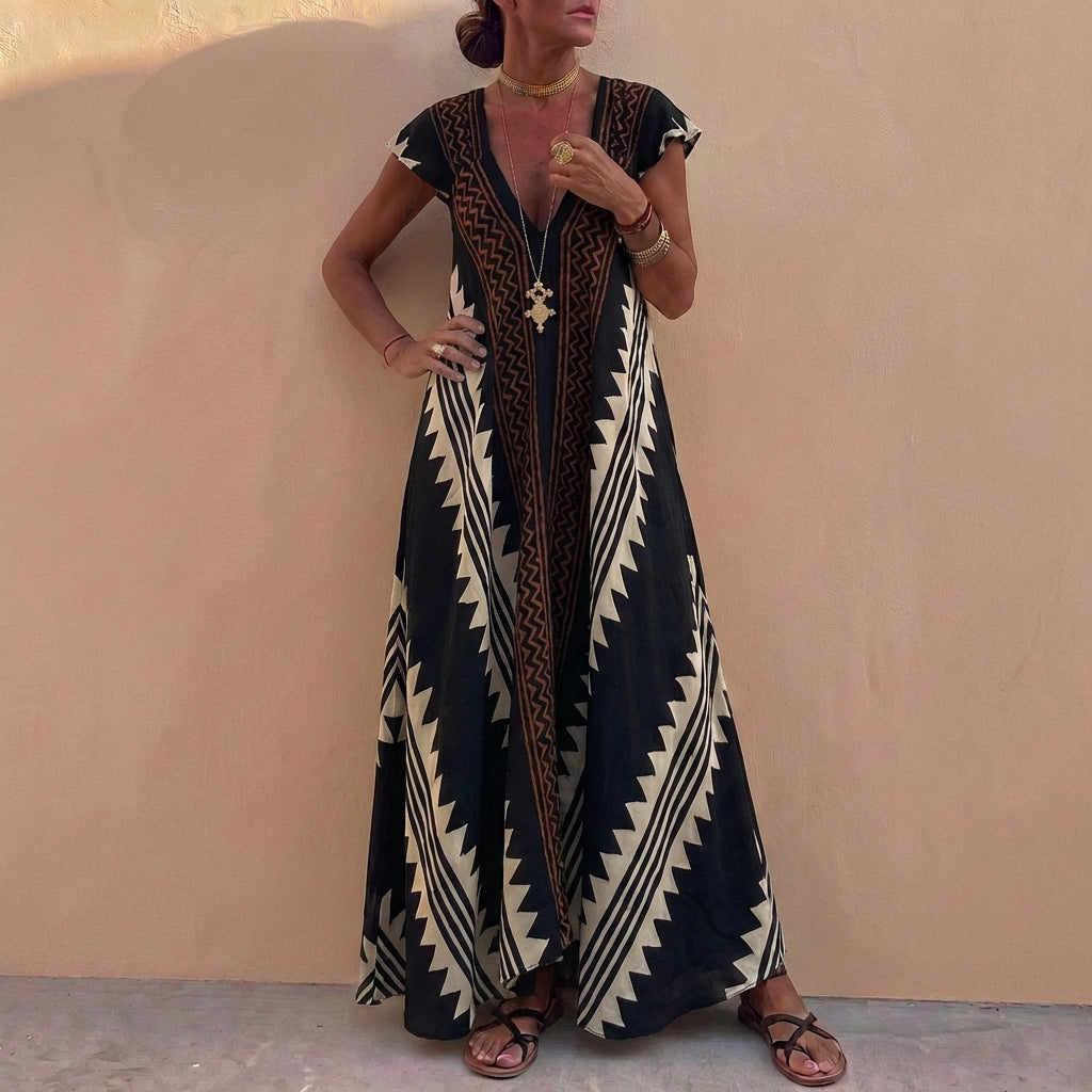 Bohemian-Inspired Flowing A-Line Maxi Dress with Deep V-Neck and Geometric Motifs