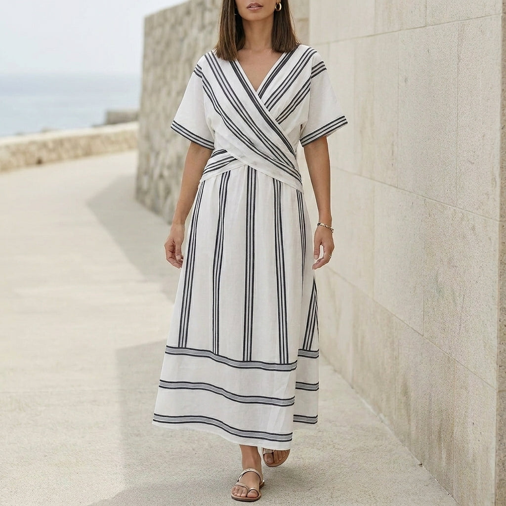 Elegant Pleated Flared Maxi Dress with Wrap-Style V-Neck and Textured Trim