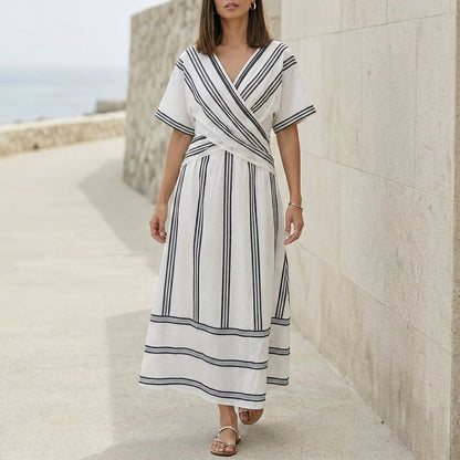 Elegant Pleated Flared Maxi Dress with Wrap-Style V-Neck and Textured Trim