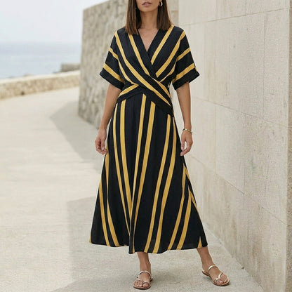 Elegant Pleated Flared Maxi Dress with Wrap-Style V-Neck and Textured Trim
