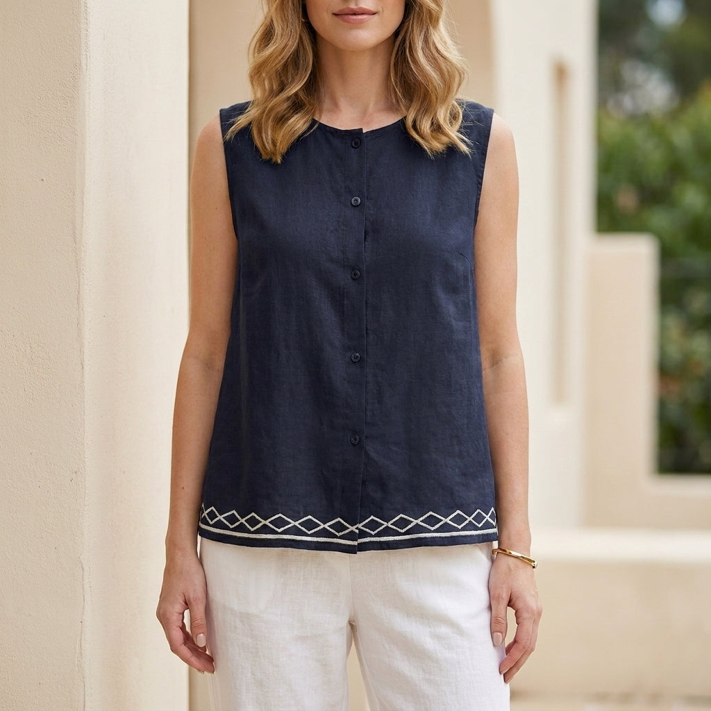 Relaxed Sleeveless Button Front Blouse with Minimalist Embroidered Hem Detail