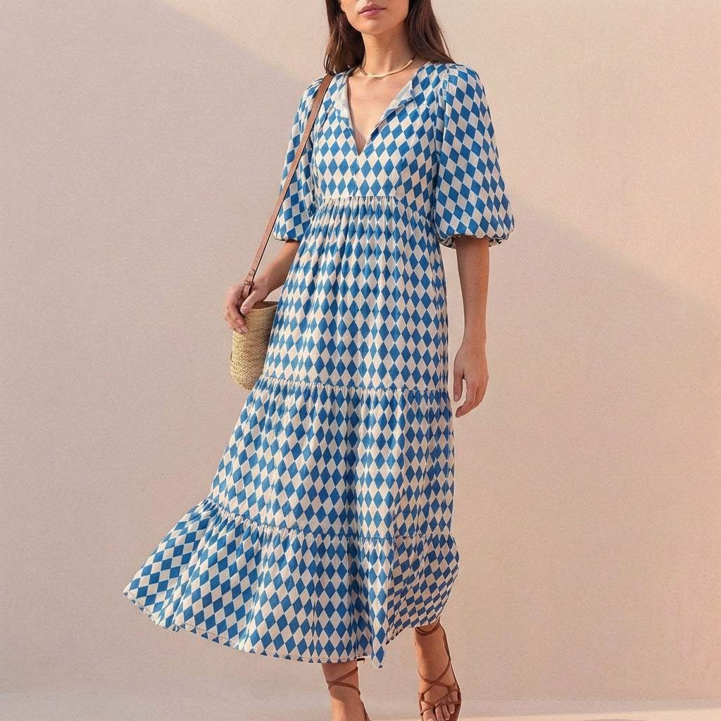 Elegant Flowing V-Neck Midi Dress with Puff Sleeves and Tiered Skirt