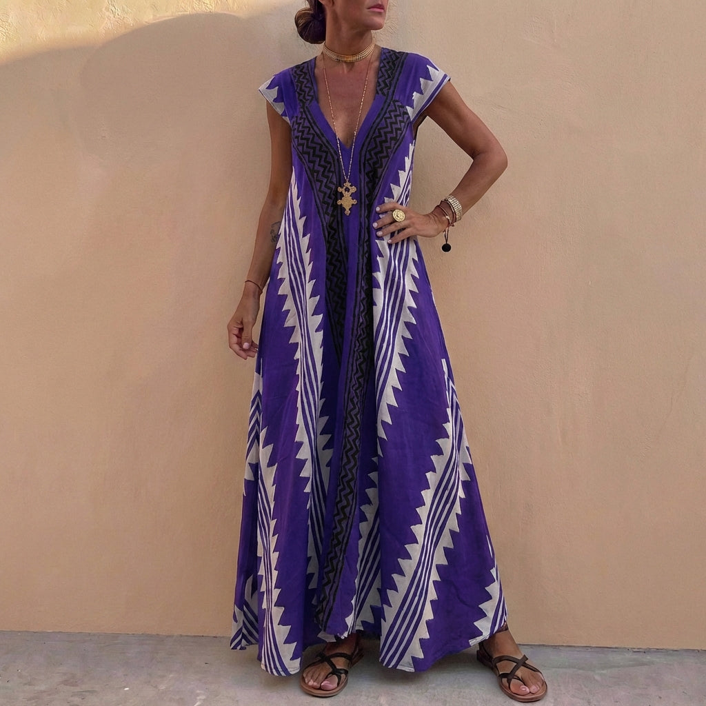 Bohemian-Inspired Flowing A-Line Maxi Dress with Deep V-Neck and Geometric Motifs