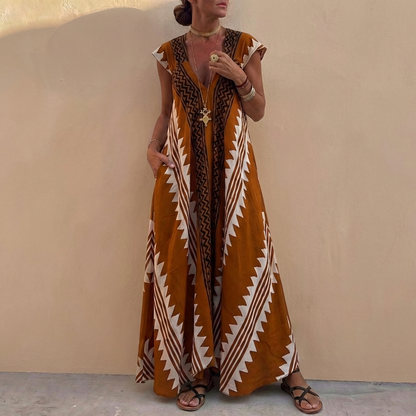 Bohemian-Inspired Flowing A-Line Maxi Dress with Deep V-Neck and Geometric Motifs