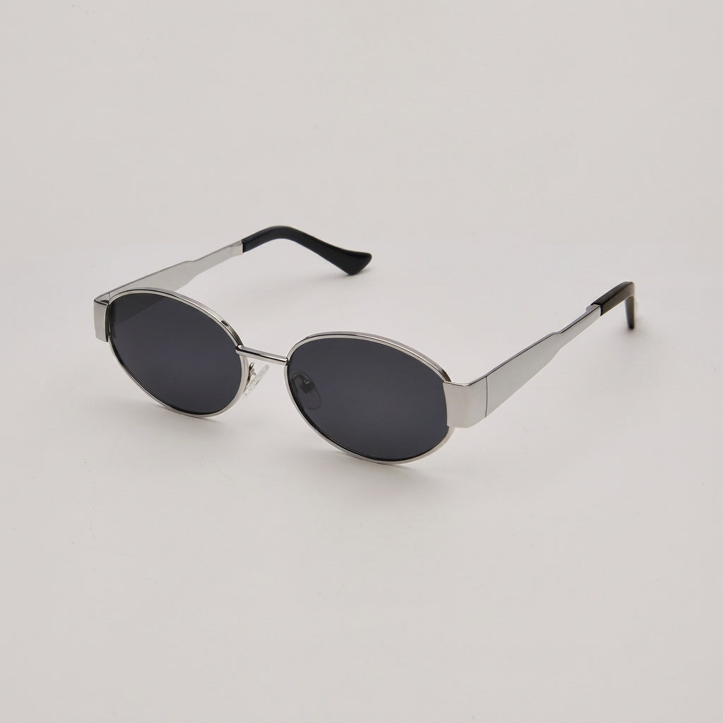 Retro-Inspired Oval Sunglasses with Sleek Metallic Frames and Patterned Temples