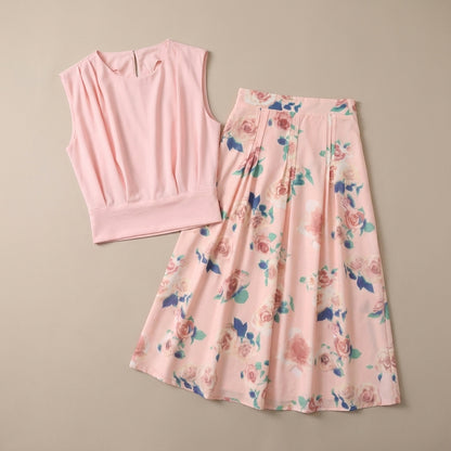 Graceful Two-Piece Set with Round Neck Top and Pleated Midi Skirt