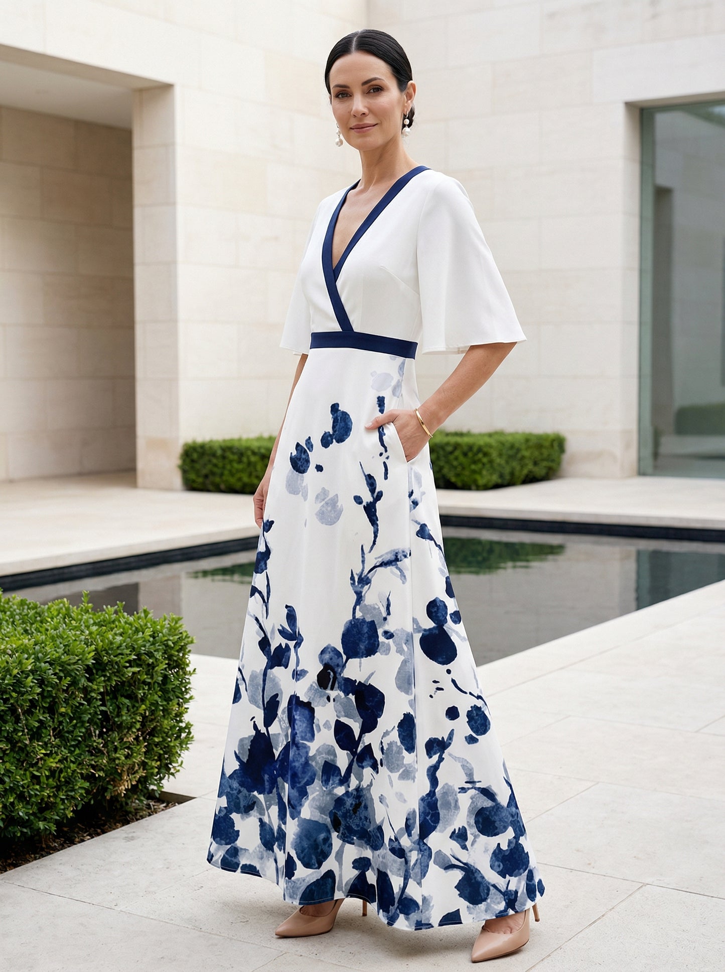 Elegant Floral Print V-Neck Maxi Dress with Flutter Sleeves and Pockets