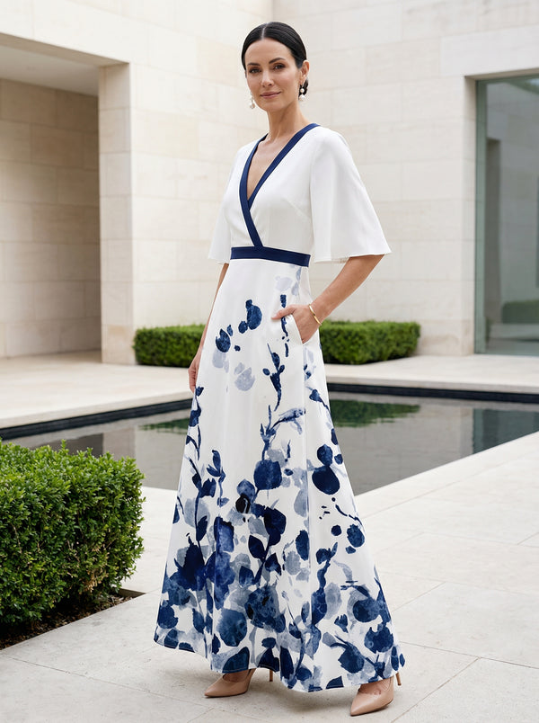 Elegant Floral Print V-Neck Maxi Dress with Flutter Sleeves and Pockets