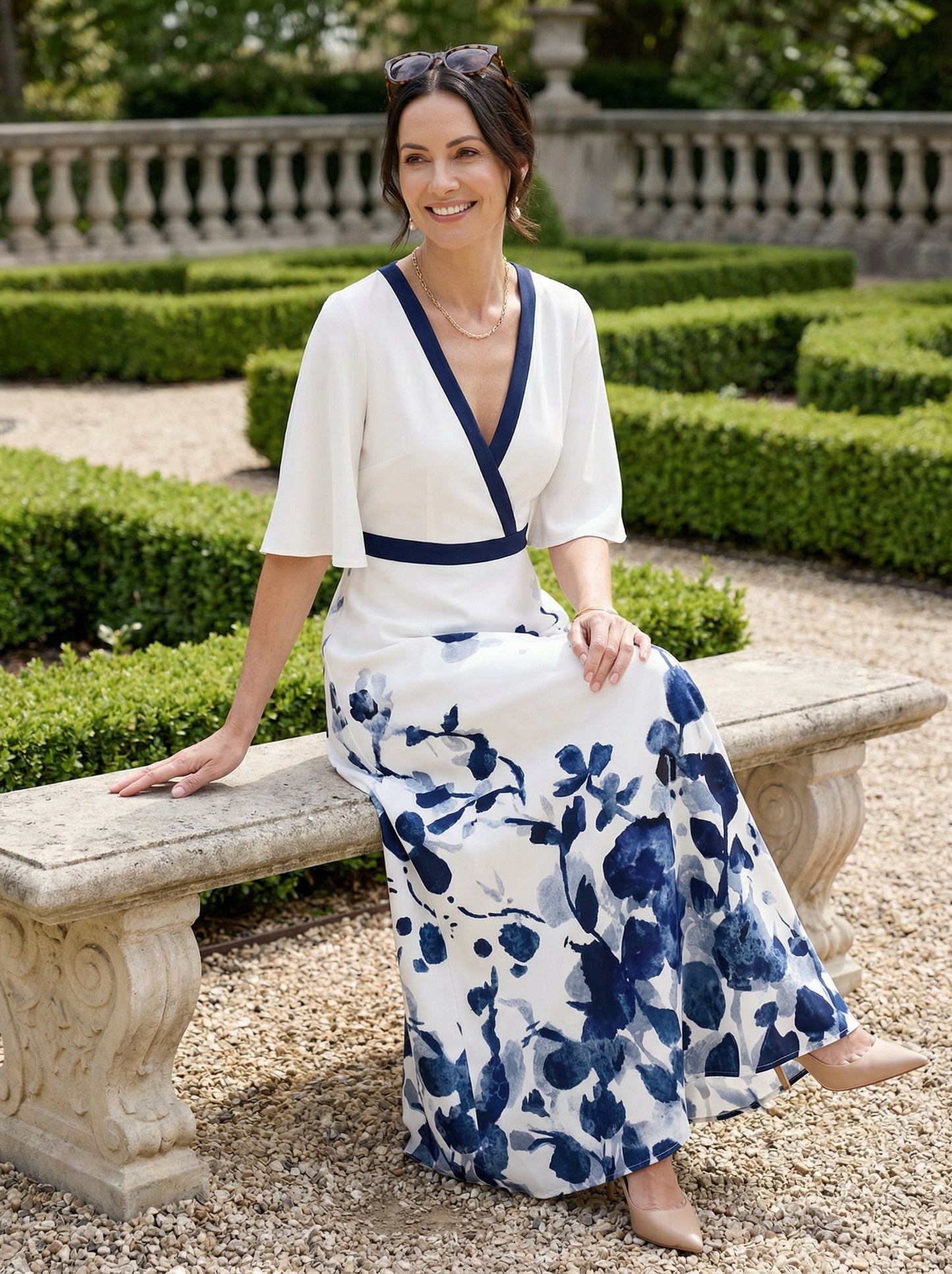 Elegant Floral Print V-Neck Maxi Dress with Flutter Sleeves and Pockets