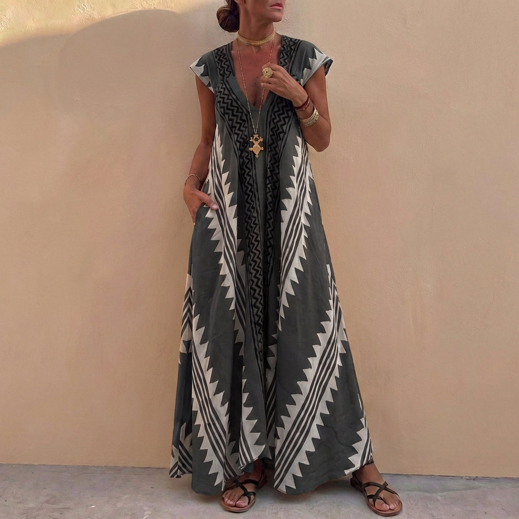 Bohemian-Inspired Flowing A-Line Maxi Dress with Deep V-Neck and Geometric Motifs
