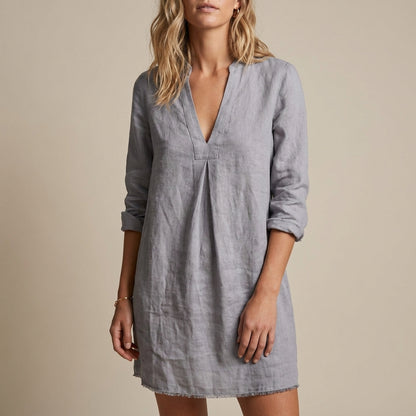 Relaxed V-Neck Tunic Mini Dress with Subtle Pleat and Raw-Edge Hem