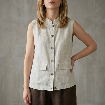 Minimalist Button-Up Sleeveless Blouse with Relaxed Fit and Front Pockets
