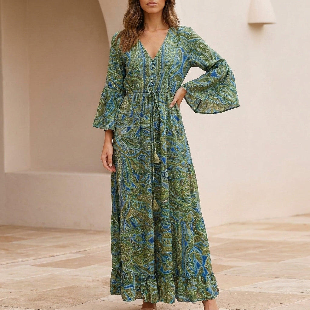 Flowing Bohemian Maxi Dress with Tiered Ruffles and Trumpet Sleeves