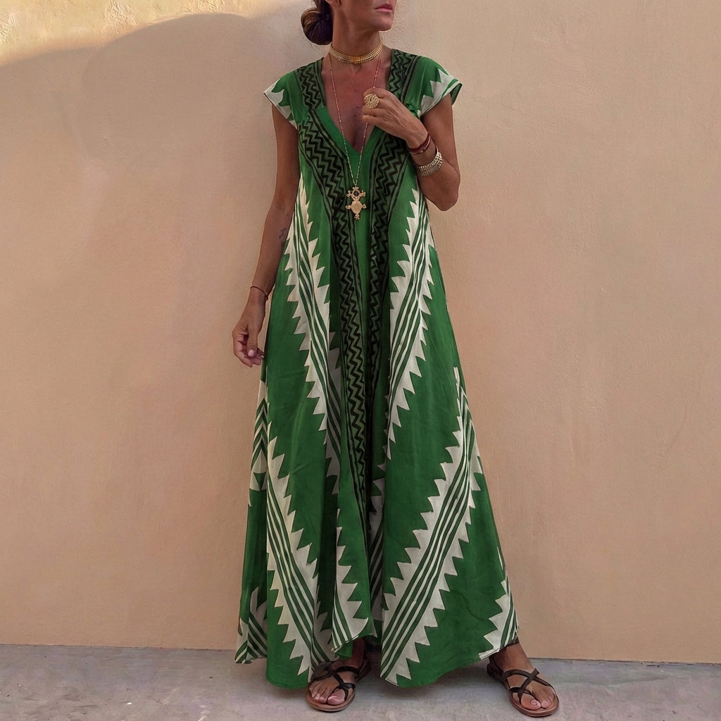 Bohemian-Inspired Flowing A-Line Maxi Dress with Deep V-Neck and Geometric Motifs