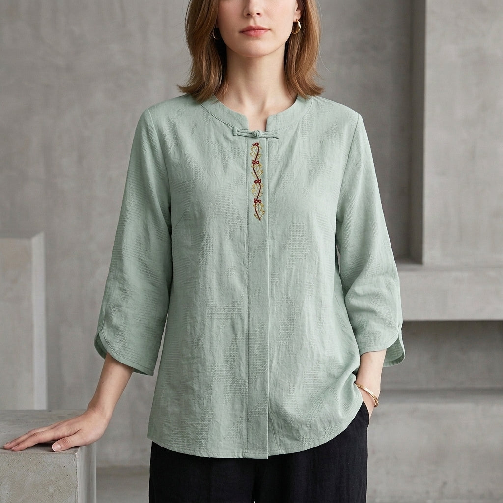 Bohemian Embroidered Blouse with Relaxed Fit and Tassel Tie Detail