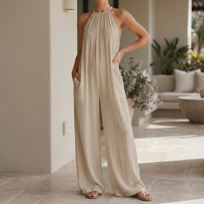 Pleated Halter Jumpsuit with Flowing Wide Leg Silhouette