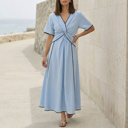 Elegant Pleated Flared Maxi Dress with Wrap-Style V-Neck and Textured Trim