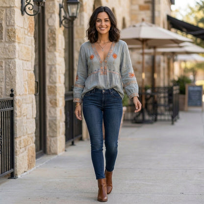 Embroidered V-Neck Blouse with Wide Cuffs and Peplum Detail
