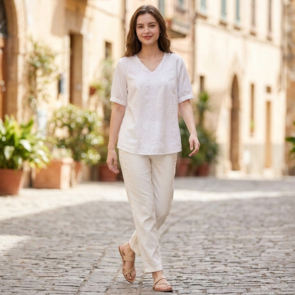 Embroidered V-Neck Blouse with Textured High-Low Hem and Soft Draping
