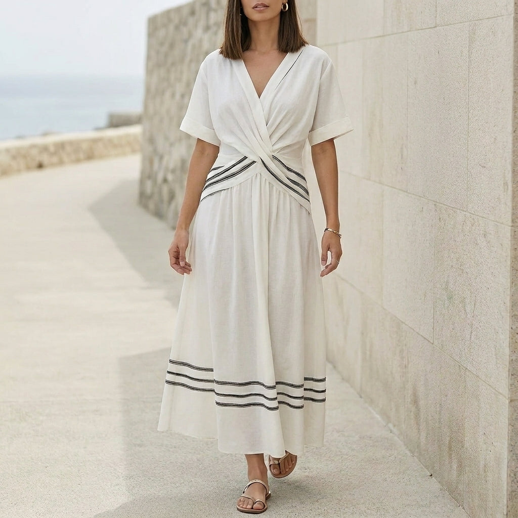 Elegant Pleated Flared Maxi Dress with Wrap-Style V-Neck and Textured Trim