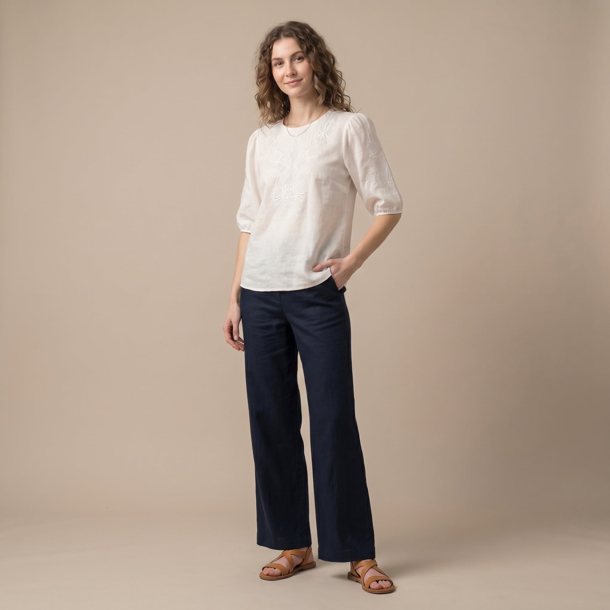 Relaxed Woven Top with Intricate Floral Embroidery and Puff Sleeves