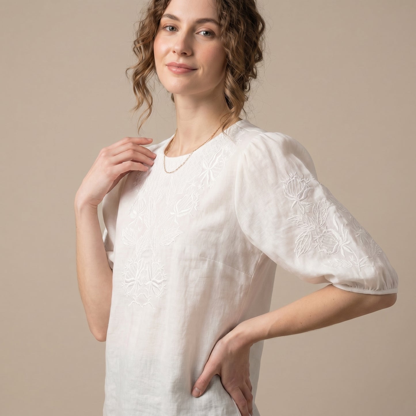 Relaxed Woven Top with Intricate Floral Embroidery and Puff Sleeves