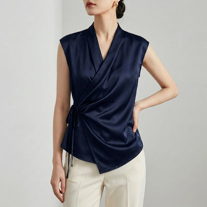 Tailored Sleeveless Wrap Blouse with Pleated Draping and Side Tie Closure