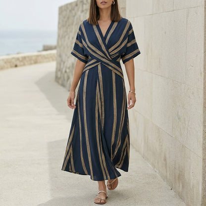 Elegant Pleated Flared Maxi Dress with Wrap-Style V-Neck and Textured Trim