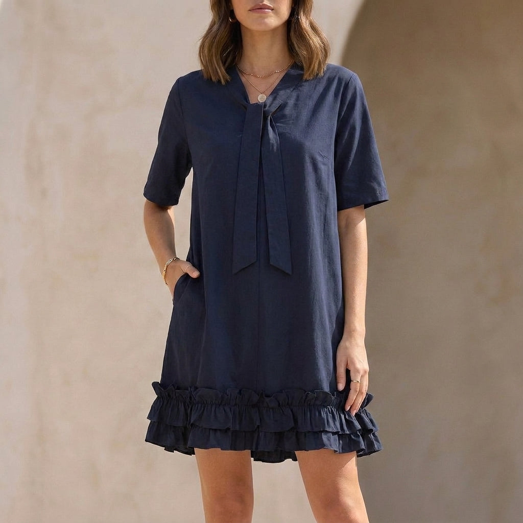 Relaxed Ruffle Hem Mini Dress with Elegant Tie Neck Detail
