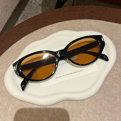 Retro-Inspired Narrow Cat-Eye Sunglasses with Glossy Structured Frame
