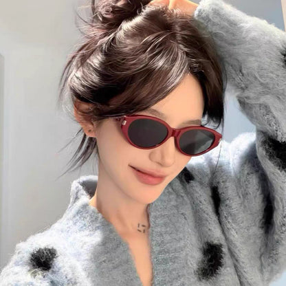 Retro-Inspired Narrow Cat-Eye Sunglasses with Glossy Structured Frame